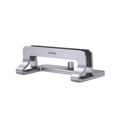 Soporte Vertical para Laptop / Adecuado para escritorio / Anchura Ajustable (12-26mm) / Amplia compatibilidad / Anti-Arañazos / Anti-Deslizante /Ajustable Mediante Tornillos / Color Plata / Alumini